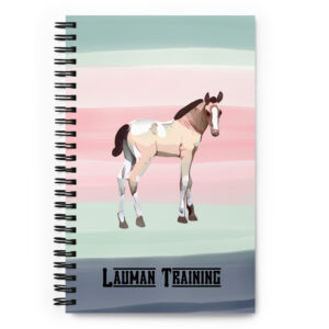 Wild Foals and Kids foal on a notebook for Lauman Training